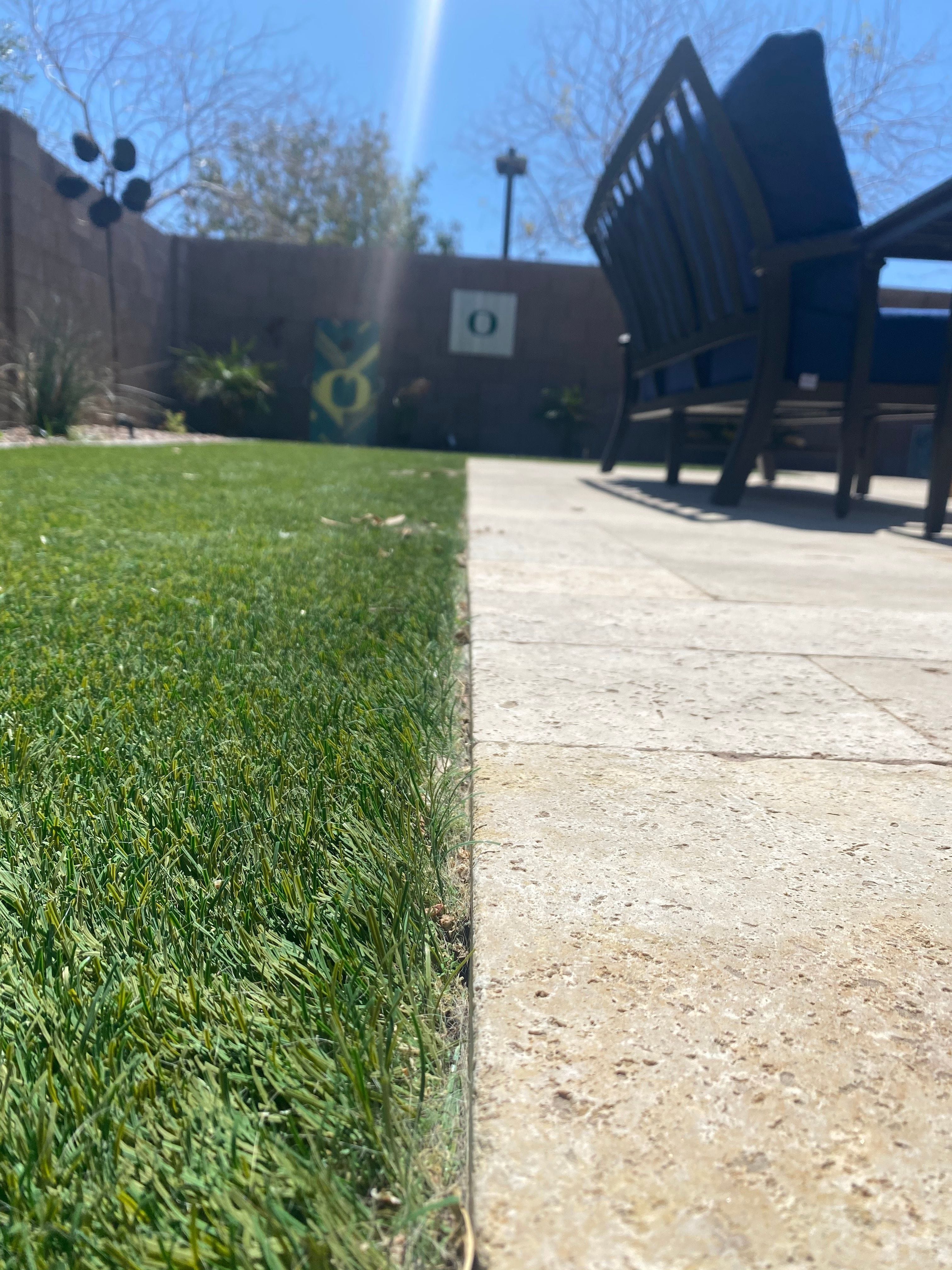 Restored and professionally groomed artificial turf fibers